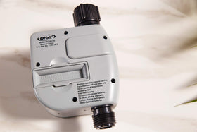 Orbit easy-install timer on hose end illustrates straightforward setup for busy homeowners.