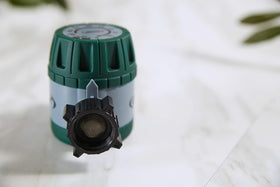Orbit mechanical hose timer in use demonstrating outdoor irrigation scheduling