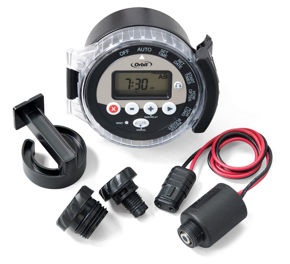 Orbit outdoor-battery-powered-sprinkler-timer installed on a garden mainline for wireless irrigation control.