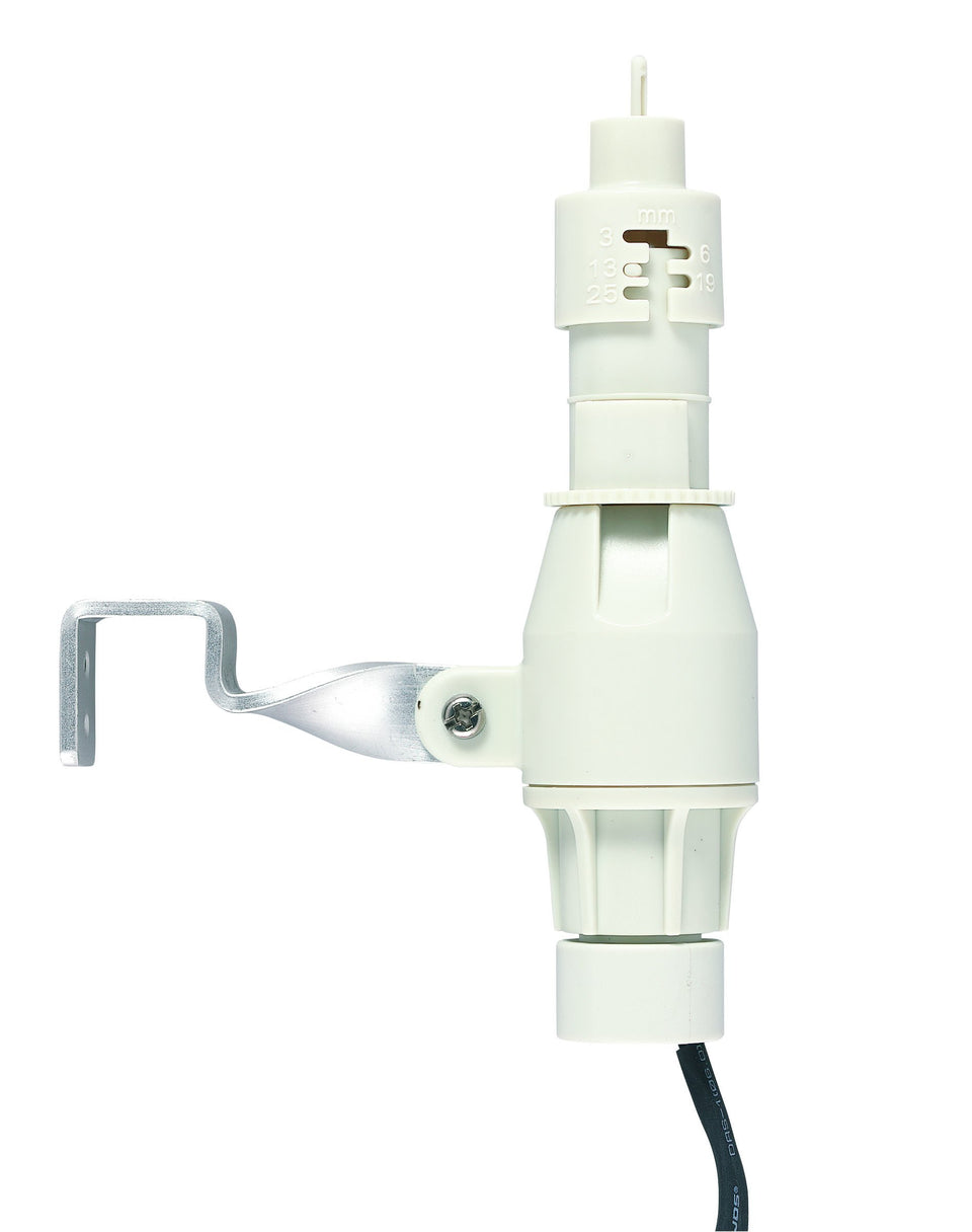 Orbit Rain and Freeze Sensor mounted on an eave detects rainfall to pause irrigation automatically.