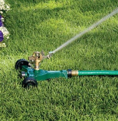 Orbit sprinkler on a metal wheel base rolls easily for flexible placement