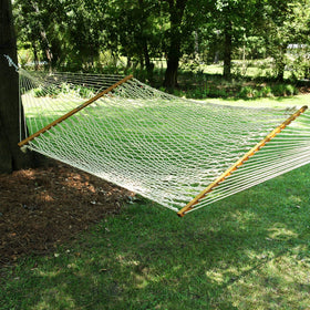 Original Pawleys Island backyard relaxation scene shows ample comfort and space.