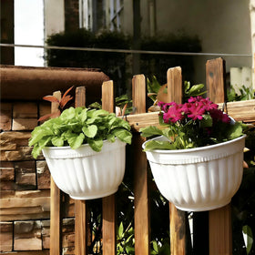 ORIMERC drainage hole closeup with plug option for indoor or outdoor use.