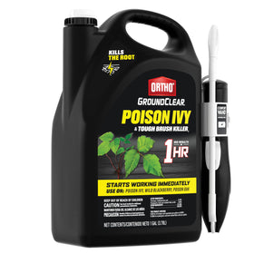 Ortho GroundClear spray along a fence line to protect nearby plants