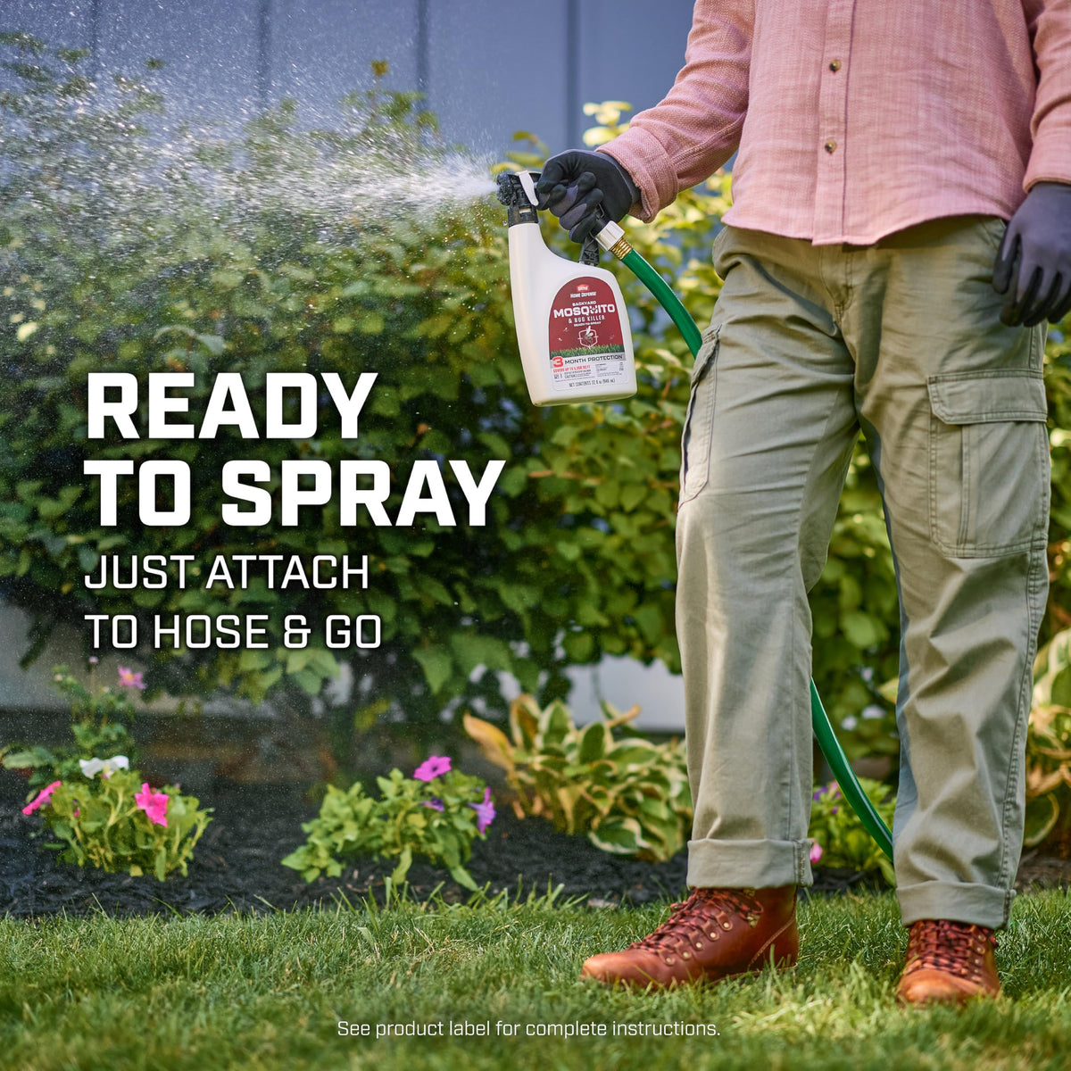 Ortho Home Defense spraying lawn near ornamental plants for yard protection.