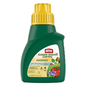 Ortho MAX garden disease concentrate bottle ready for mixing to protect plants.