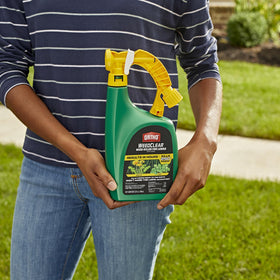 Ortho WeedClear being applied on a lawn for easy, effective weed control