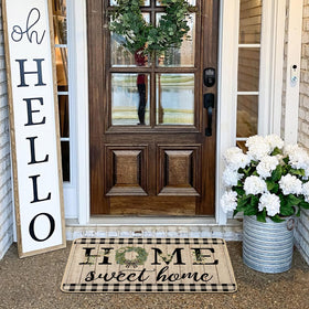 Non-slip rubber backing of ORTIGIA doormat for secure footing.