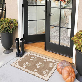 Othilic front door mat low-profile design fits under doors while trapping dirt.