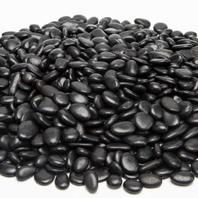 OUPENG landscaping black river pebbles add natural contrast outdoors.