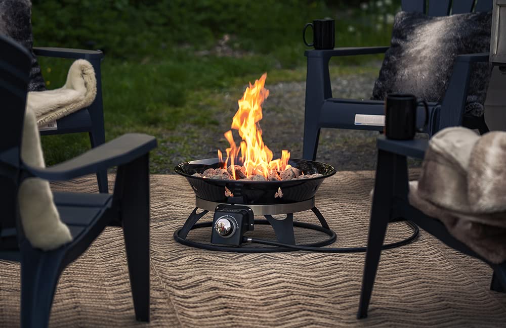 Outland Living Cypress fire bowl with lava rock enhances flicker and ambiance