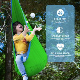 OUTREE Kids Pod Swing Seat reading nook setup for cozy indoor relaxation.