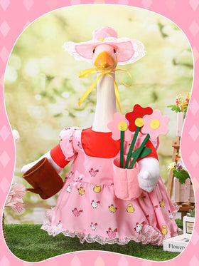 Outus tiny watering can detail enhances springtime decor.