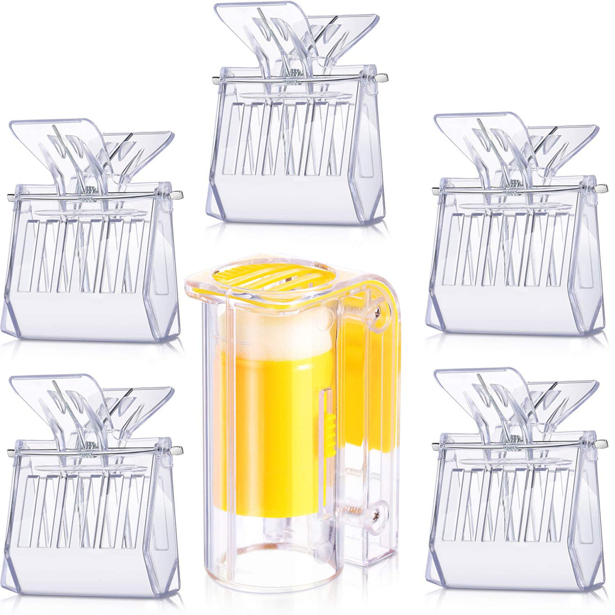 Outus queen clips and transparent cages for easy queen handling during hive work.