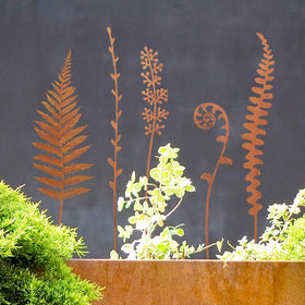 OUUJUOZ ornamental metal flower stakes enhance yard decor year-round.