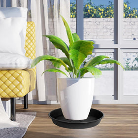 OVZILKI black plastic saucer under pot to keep surfaces clean