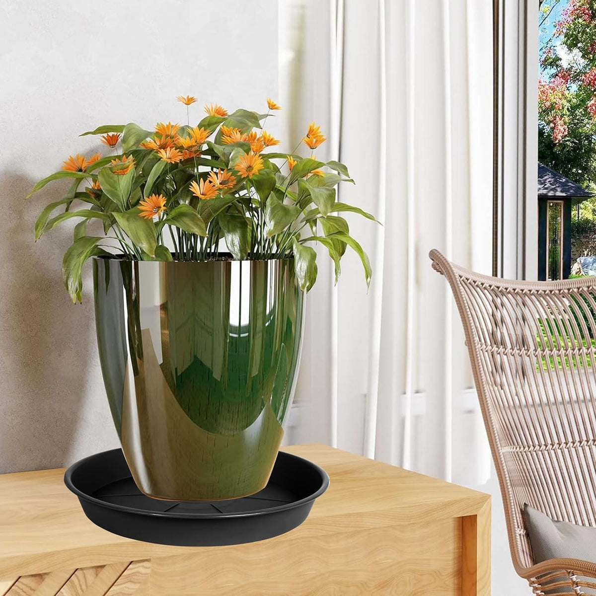OVZILKI tray catching drainage from a planter to protect surfaces.
