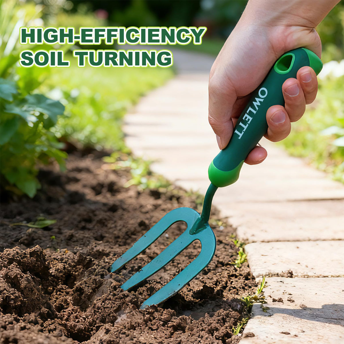 Owlett Garden Hand Fork in action digging and loosening soil