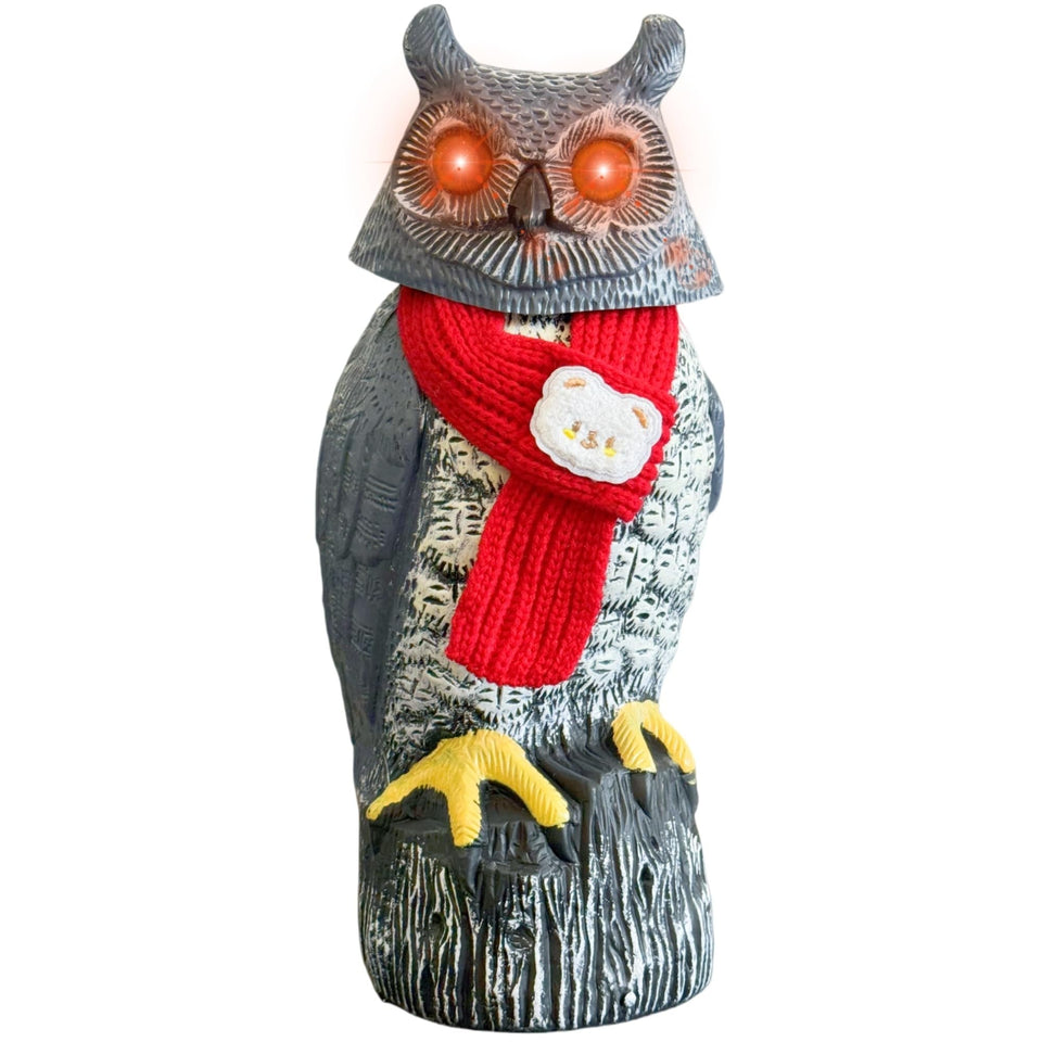 Owlsome Solar Owl with glowing eyes brightens your garden at night.