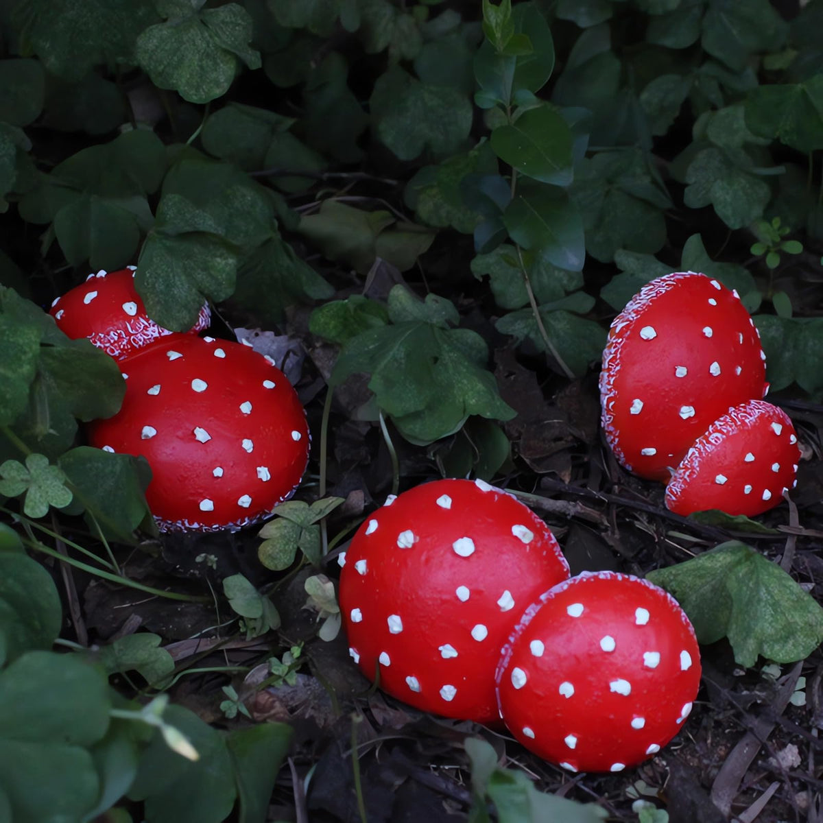 OwMell glow mushrooms in varied sizes showing decorative variety for fairy gardens.