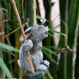 OwMell outdoor tree rabbit hanging statue creates a playful yard focal point.