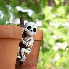OwMell skeleton planter hugger graces garden with durable, weather-ready charm