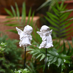 OwMell small angel stake adds delicate outdoor charm to planters.