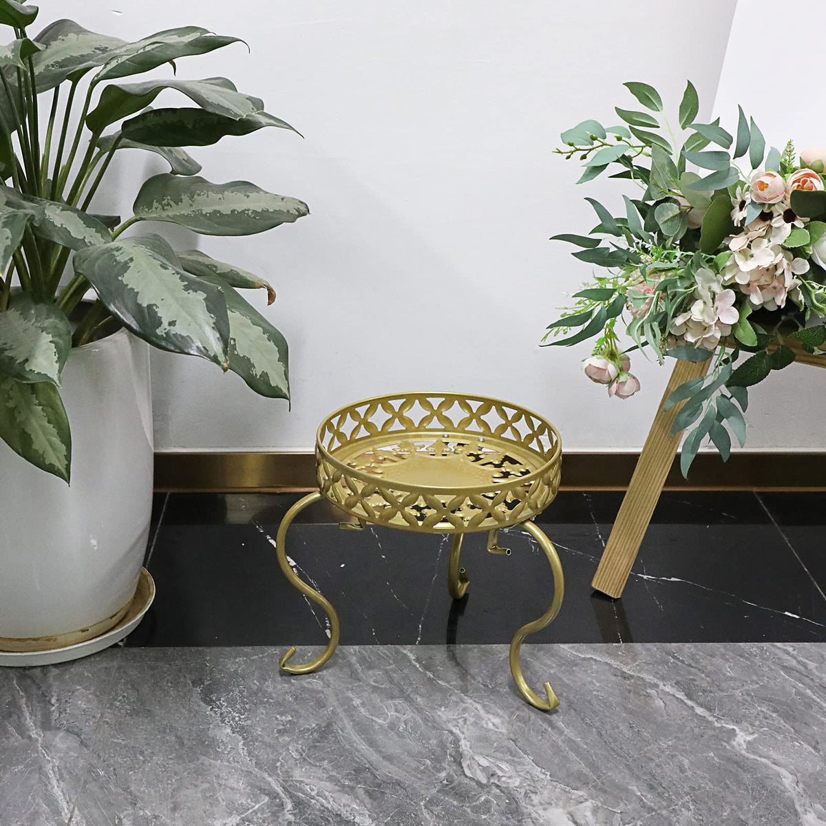 OwnMy indoor-outdoor plant stand, showing versatile corner setup for living spaces.