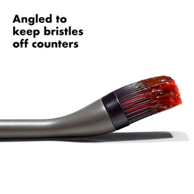 Center-hole bristles hold liquids for efficient, even basting