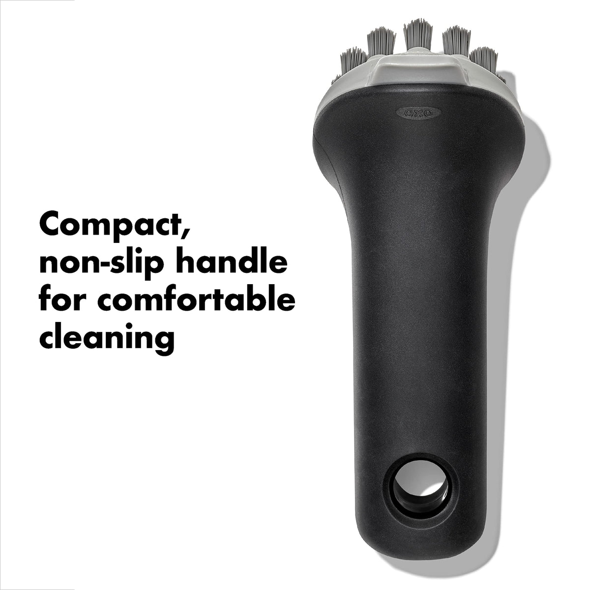 OXO Good Grips Cast Iron Brush features a compact non-slip handle for wet use.