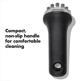 OXO Good Grips Cast Iron Brush features a compact non-slip handle for wet use.