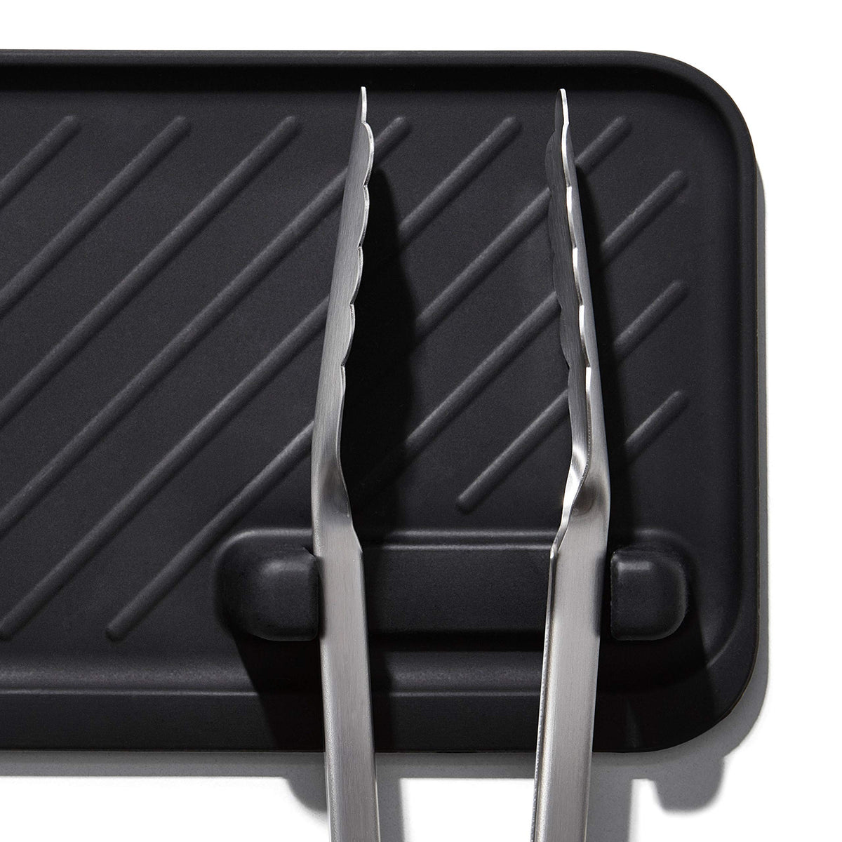 OXO Good Grips Grilling Tools Rest protects grill surfaces from scratches.