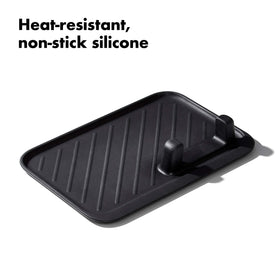OXO Good Grips Grilling Tools Rest prongs hold unlocked tongs for one-handed use.