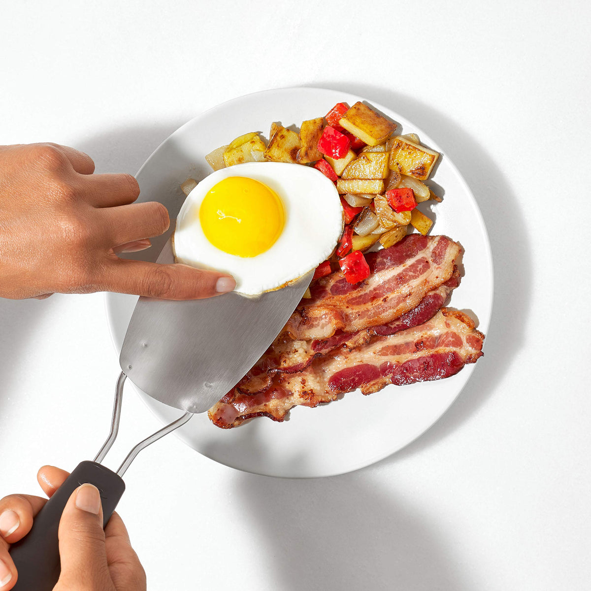 OXO Good Grips sturdy double-rod handle offers a comfortable, non-slip grip