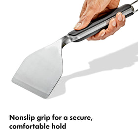 OXO Outdoor Griddle Scraper ergonomic handle for comfortable long cleaning sessions.