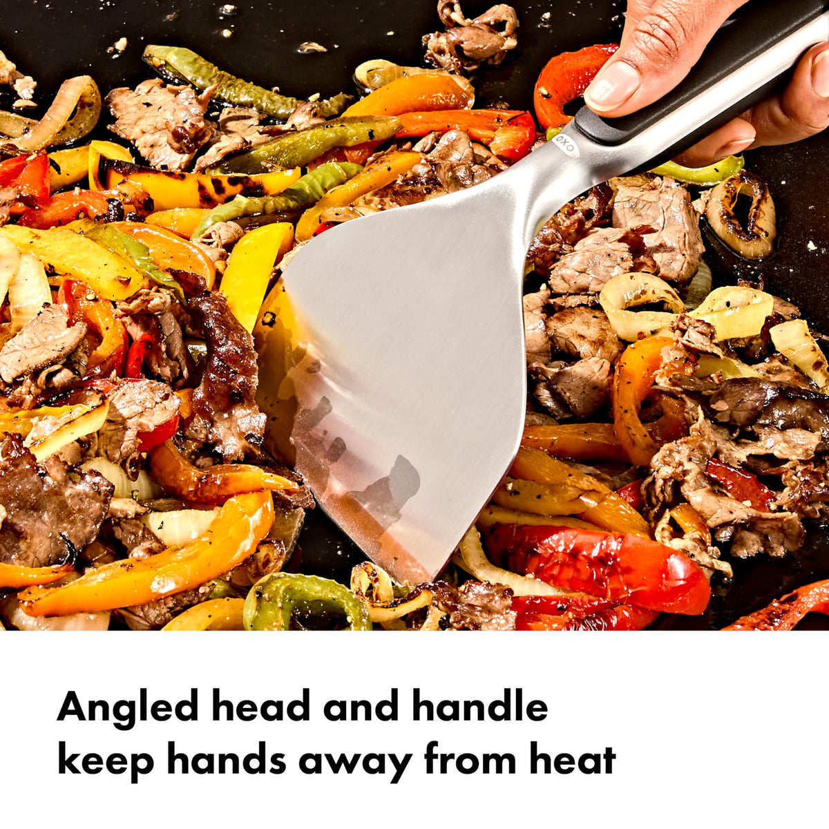 OXO Outdoor Griddle Scraper hanging ring for easy storage after barbecues.