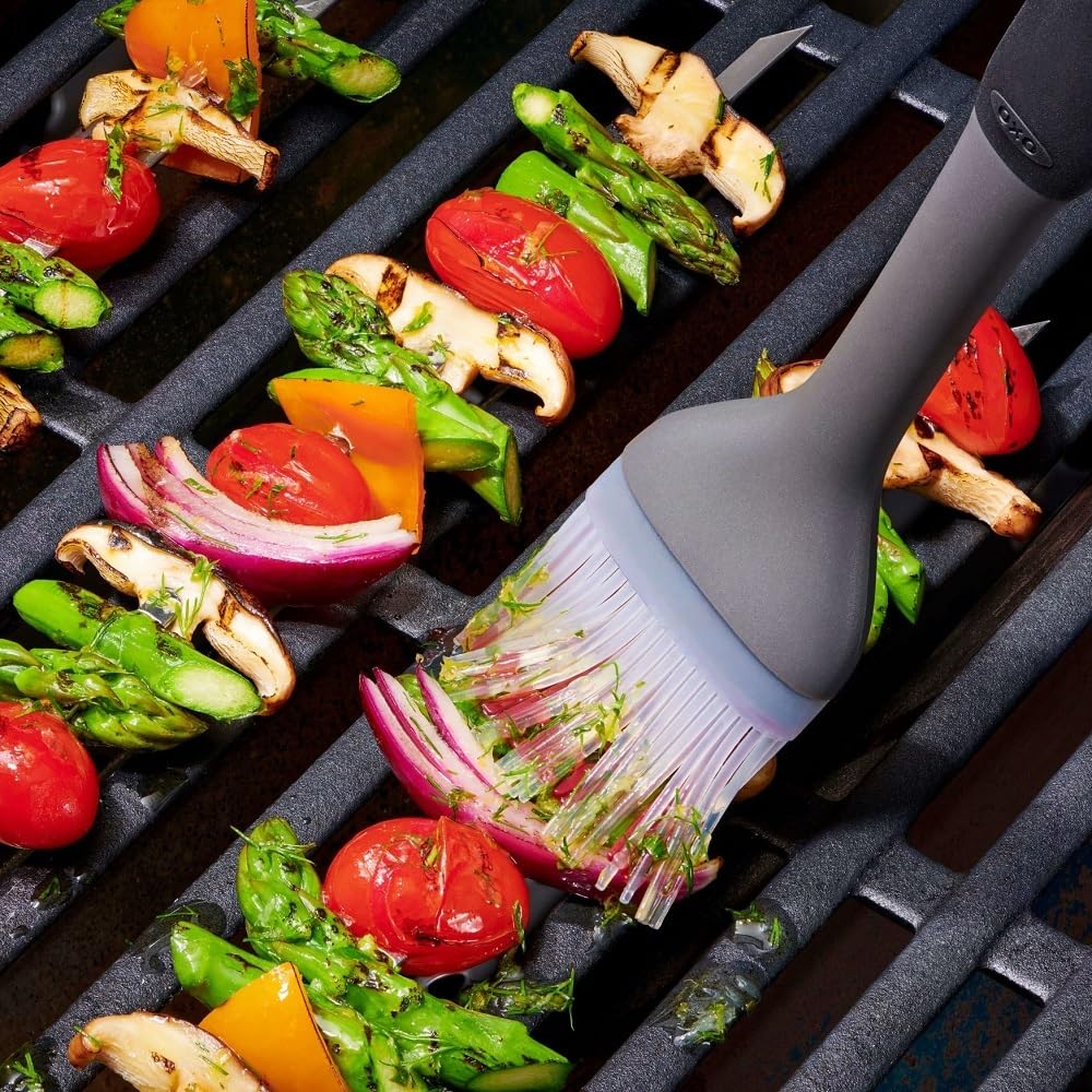 OXO ergonomic handle reduces fatigue during long barbecue sessions
