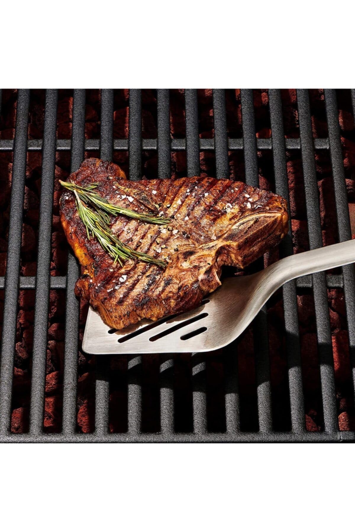 OXO Outdoor Grilling Turner ideal for flipping burgers, vegetables, and fish.