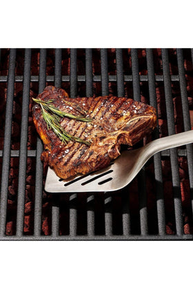OXO Outdoor Grilling Turner ideal for flipping burgers, vegetables, and fish.