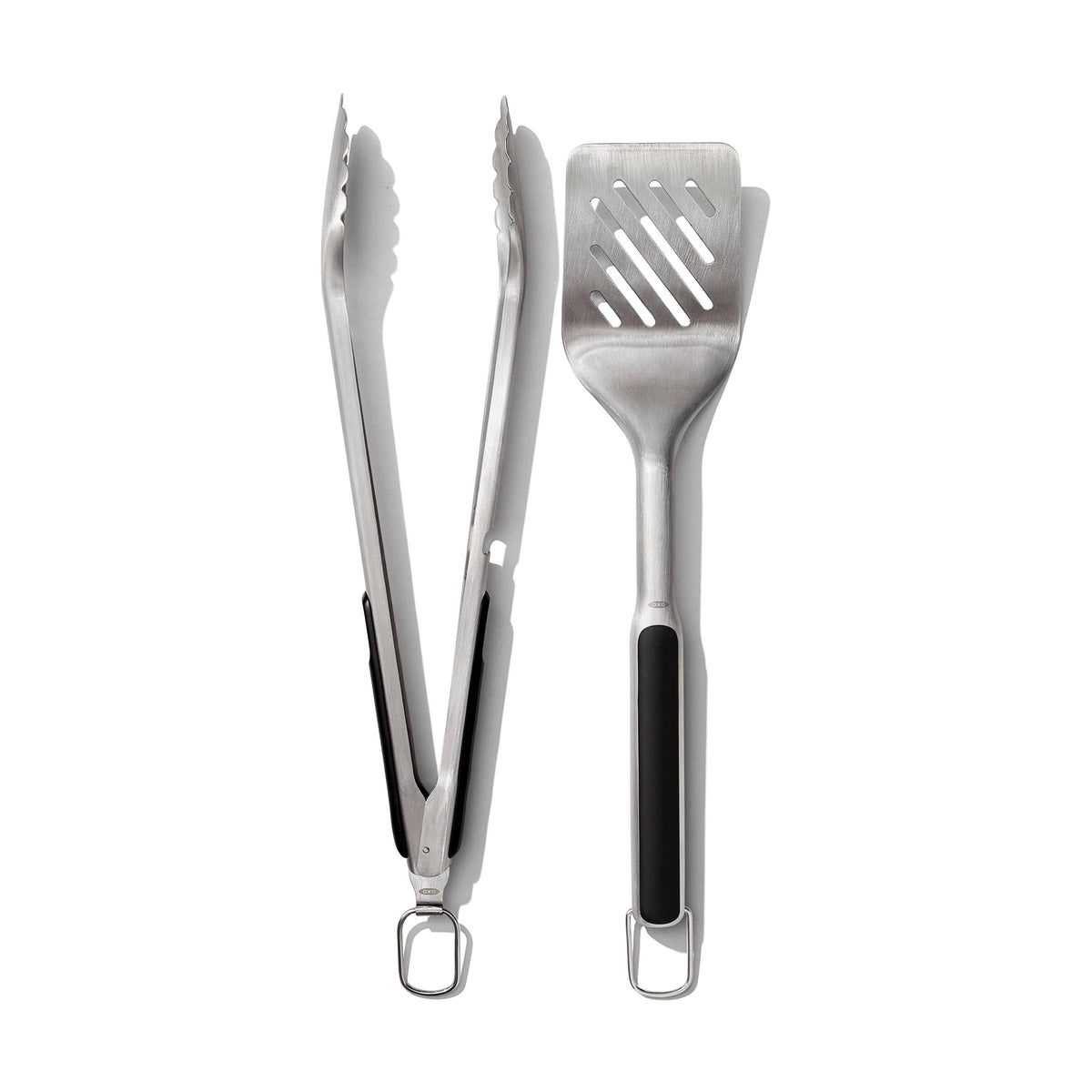 OXO outdoor grilling turner with double-bend leverage for easy flipping