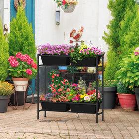 OYEAL black elevated planter blends with outdoor spaces