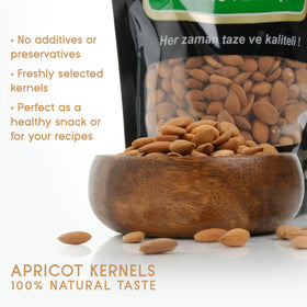 Close-up of raw OZ ERCIYES apricot kernels showing natural texture