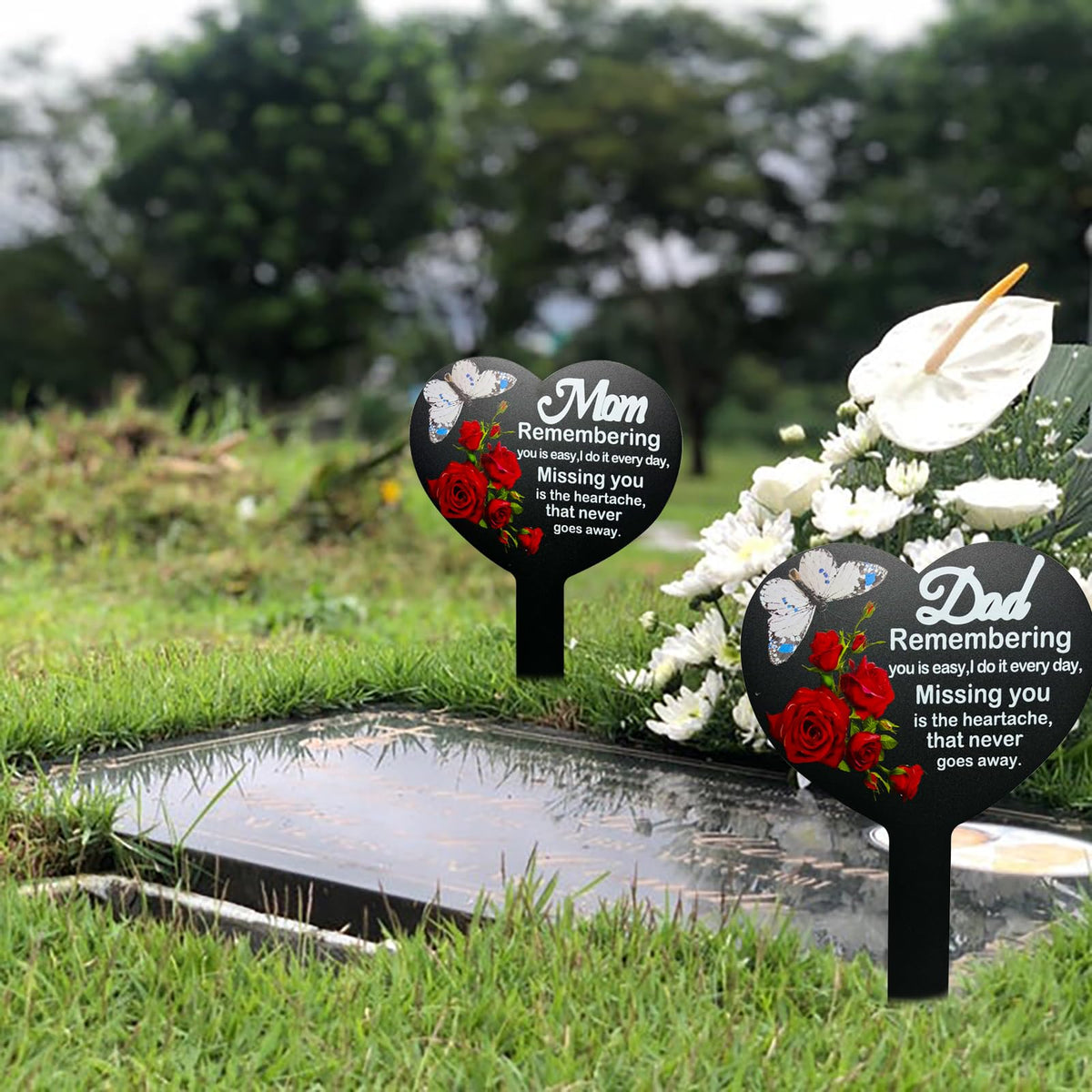 OZIO outdoor grave stake showing stable installation in a cemetery setting.