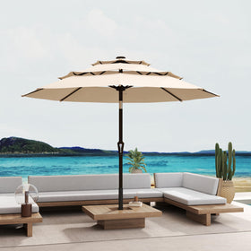 Patio Kingdom 10ft beige umbrella resists water and fading.