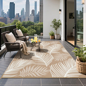 Pauwer leaf design double-sided rug complements any outdoor space.