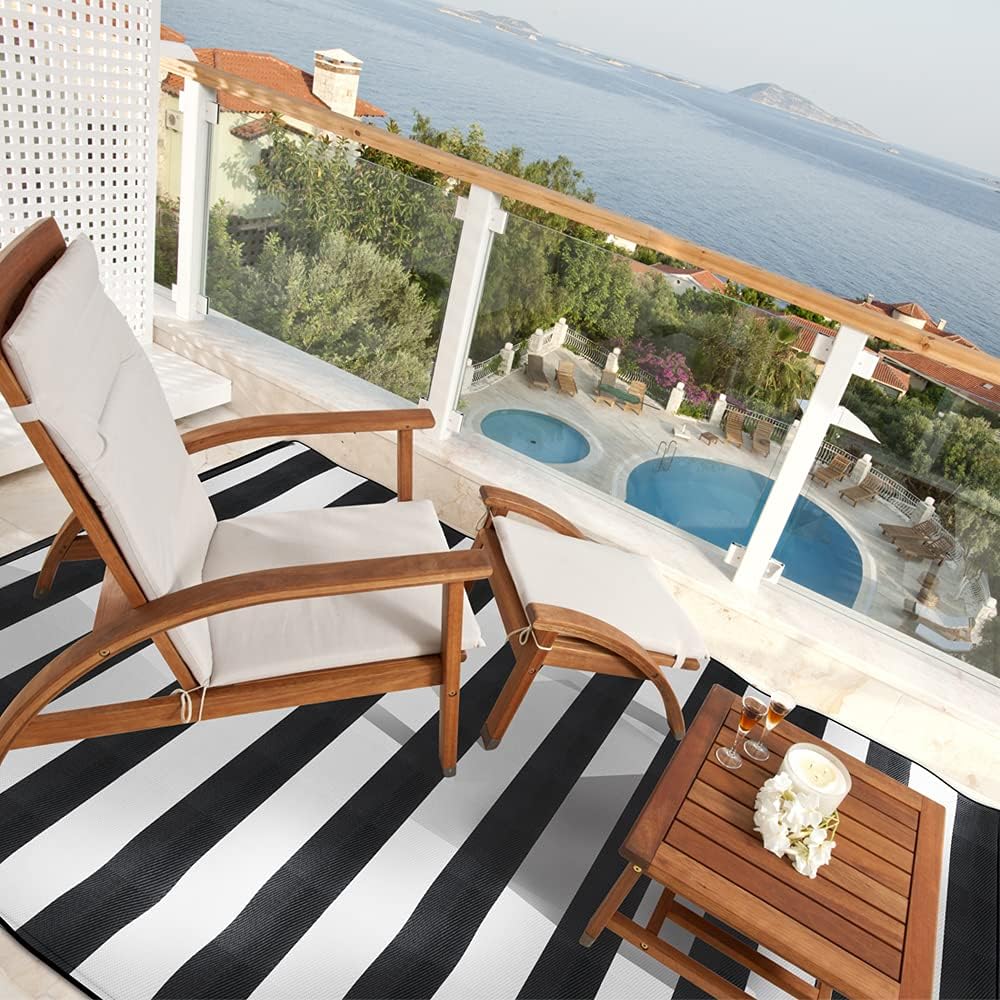 Pcinfuns UV-stabilized rug; resists fading on sunny decks.