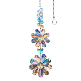 PEDOBO crystal flower suncatcher in window casting rainbow light