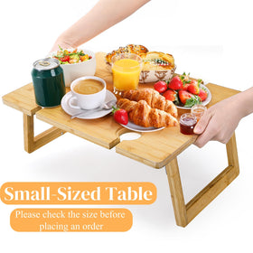 Peohud table with four wine glass holders visible.