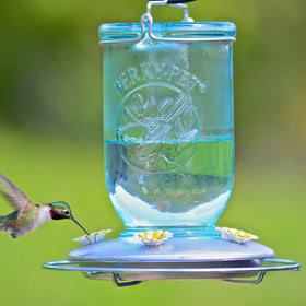 Perky-Pet blue glass mason-jar bottle highlights nostalgic outdoor decor