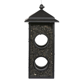 Perky-Pet Fly-Thru Feeder lid-cap system secures seeds outdoors for reliable feeding.